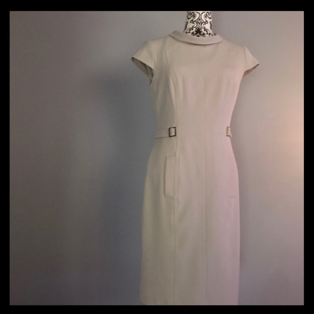 Chrysta B beige dress .